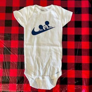 Mickey Mouse Nike baby onesie